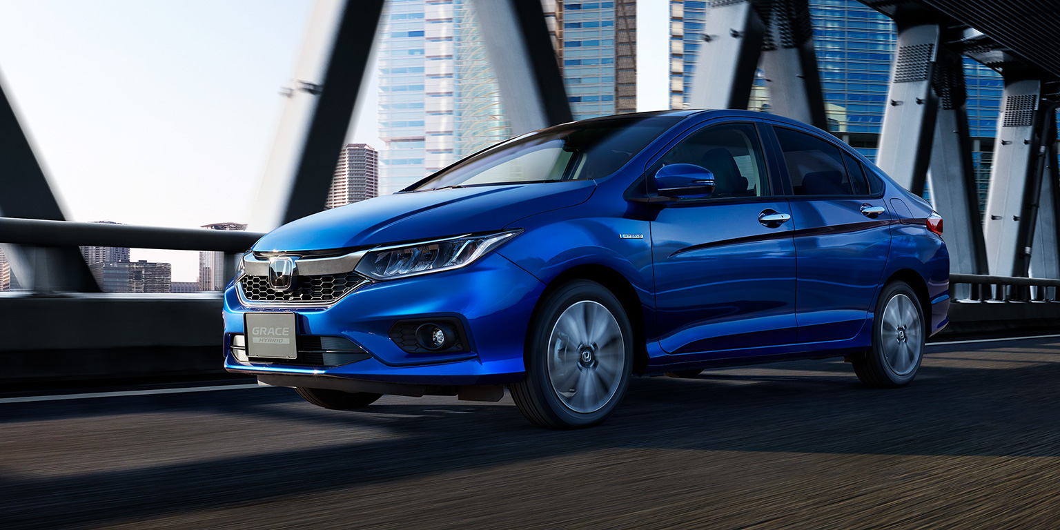 Photo:HYBRID EX・Honda SENSING(FF) ボディカラーはブリリアントスポーティブルー・メタリック